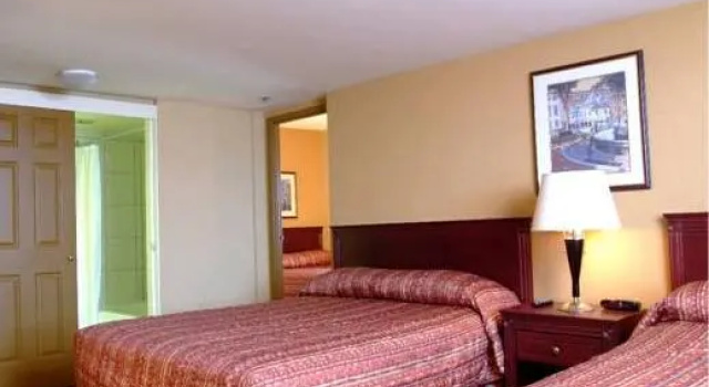 Кровать в общем номере Hotel Classique