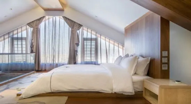 Двухместный семейный люкс Luxury Дуплекс с видом на море Dali Luchun Garden Hotel