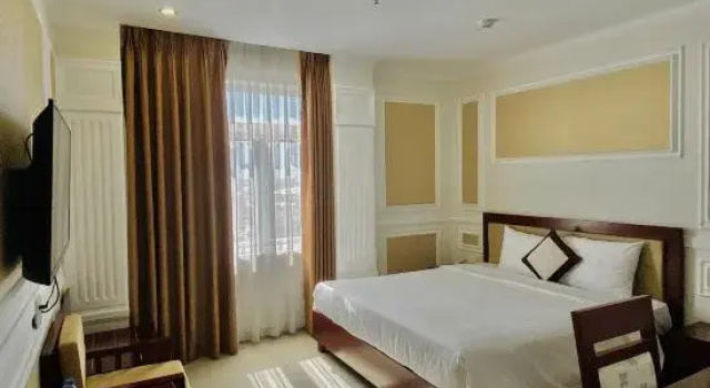 Deluxe triplaágyas szoba Lychee Hotel