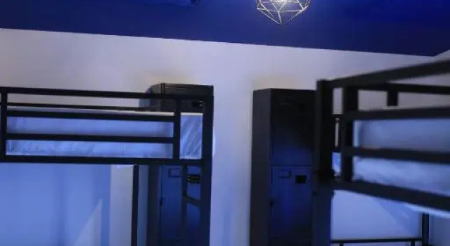 Кровать в общем номере Casa Violeta