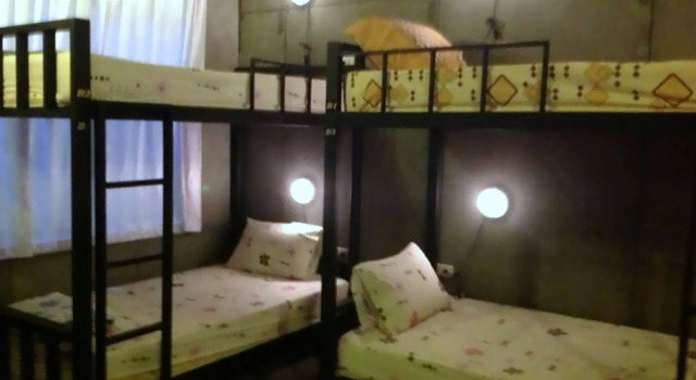 Кровать в общем номере Win Backpacker Hostel