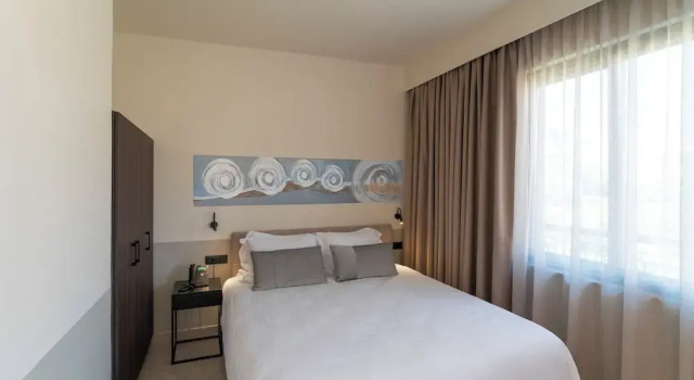 Люкс Mariette Rhodes Urban Suites