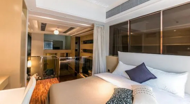 Семейный люкс Business Дуплекс с балконом Wanhao Max Hotel (Baoli Zhongda Square Huacheng Square Branch Guangzhou)