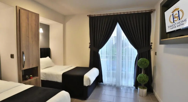 Семейный люкс с видом на горы SWEET HOME SUiTE HOTEL