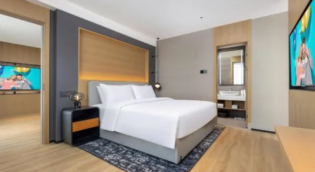 Люкс Executive Park Hotel (Qingdao Chengyang District Government Vientiane City)