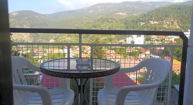 Standaard Eenpersoonskamer met balkon en  uitzicht op de bergen Two Flowers Hotel