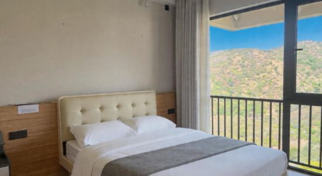 Семейный люкс с 2 комнатами с балконом и с красивым видом из окна Wohetian Vacation Apartment