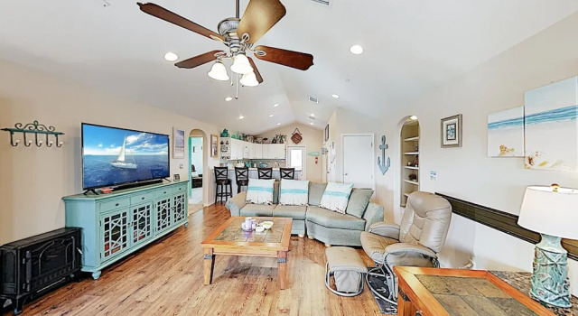 Canal-front Getaway W/ Enclosed Deck & Boat Dock 4 Bedroom Home