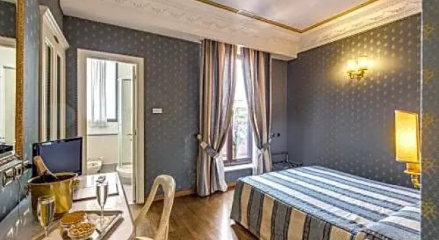 Номер Deluxe Hotel La Lumiere Di Piazza Di Spagna