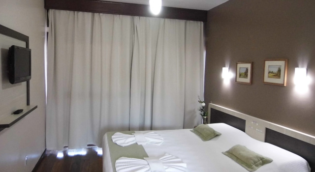 Ravena Cassino Hotel, Забронировать Отель Лагуна Санта-Катарина
