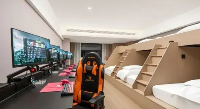 Кровать в общем номере Aimei E-Sports Hotel (Zhengxiang Wanda)