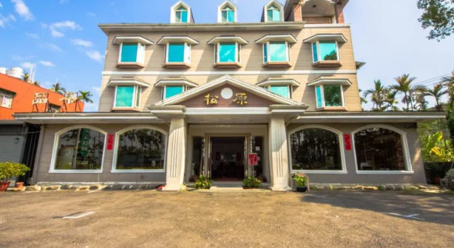 Кровать в общем номере Songyuan B&B