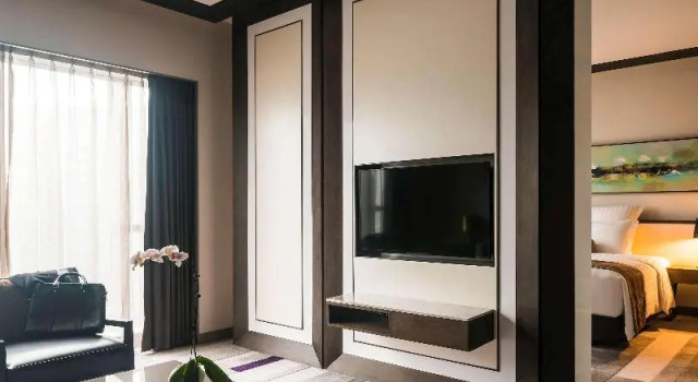 O podwyższonym standardzie dwuosobowy suite Pullman Zhuhai