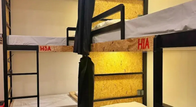 Кровать в общем номере Cafe Moto Hostel