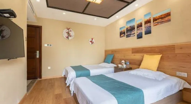 Кровать в общем номере Hangzhou Shifang Hotel
