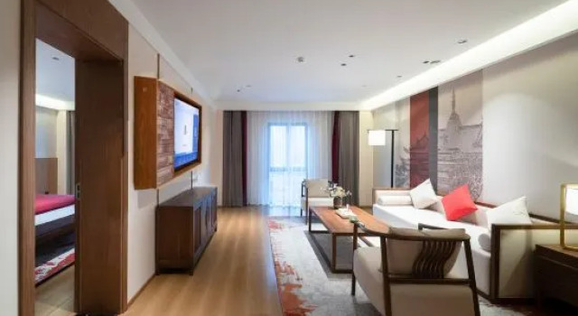 Люкс QIANNA HOTEL (Zhengzhou Shangdu Road Fangte Branch)