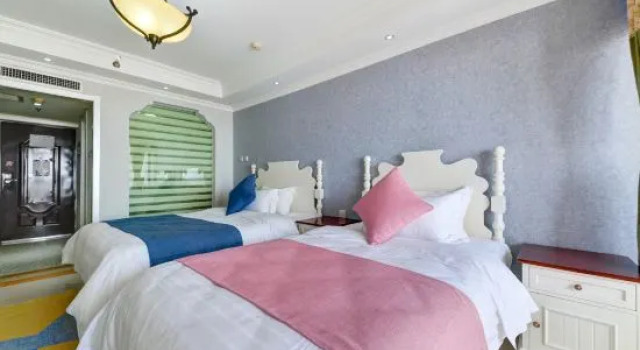 Кровать в общем номере Yunqi · light luxury seaview apartment hotel