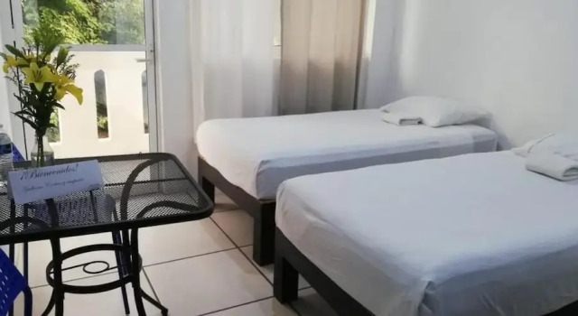 Room in Guest room - Standard room with two single beds, Buchen Sie Pension Gästehäuser in Oaxaca, Pension