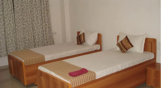 10 Blossoms Service Apartment, Rezervovat Apartmán Apartmány v Gujarat, Apartmán