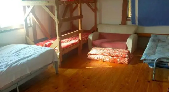 Кровать в общем номере Sky Tea House