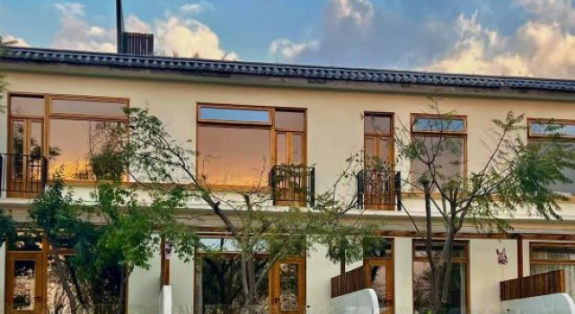 Purity Villa.Coastal Tranquility Boutique Accommodation (Dali Xizhou Town Erhai Store), Reservar Hotel boutique Hotéis em Dali com estacionamento, Estacionamento