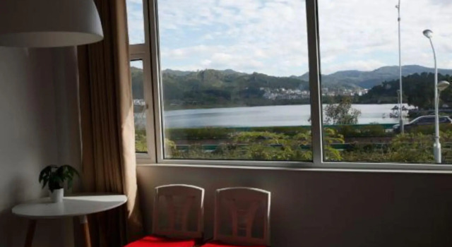 Pure Life Hostel, Rezerwuj Hostel Hotele w Pu'er z parkingiem, Parking