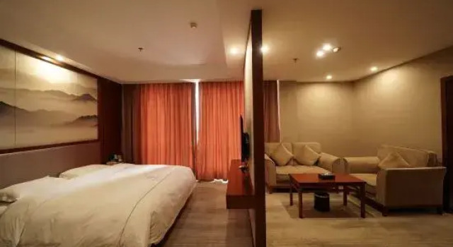 Двухместный люкс Dongpeng Hotel (Yichun Yizhou District Government Chengdong Branch)