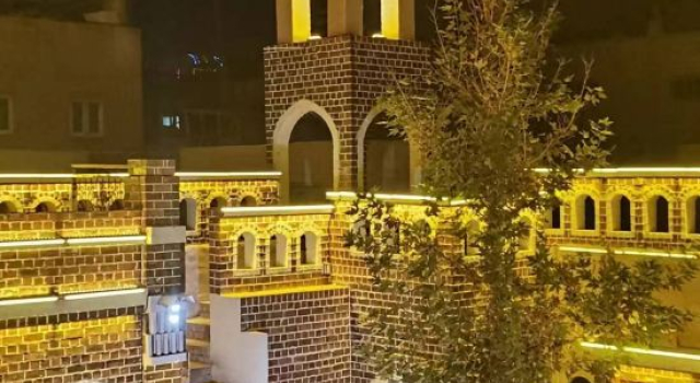 Camel   Bell  Family, Boek Hotel Kashgar Xinjiang