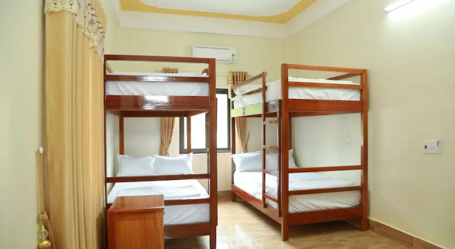 Кровать в общем номере Hotel CÔ CÚC