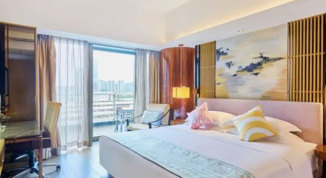 Люкс с 2 комнатами с балконом Huafa Exhibition Executive Aparthotel