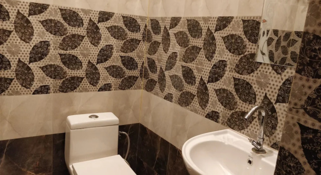 Четырёхместный люкс Central Hotel