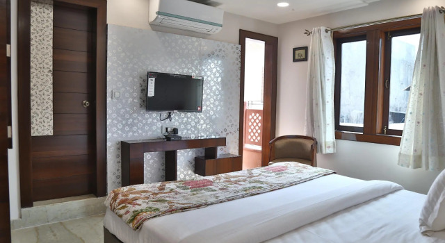Двухместный номер Deluxe с балконом Marigold Inn- Homestay