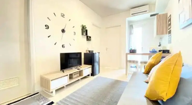 Cheerful and Homey 2BR at Parahyangan Residence Apartment By Travelio