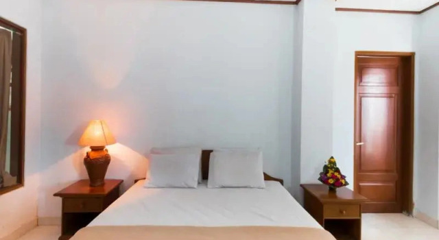Четырёхместный люкс Mahajaya Hotel