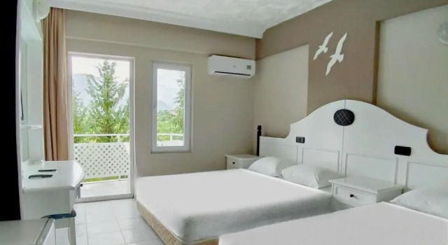 Standardowy rodzinny pokój UK Hotels Kiriş