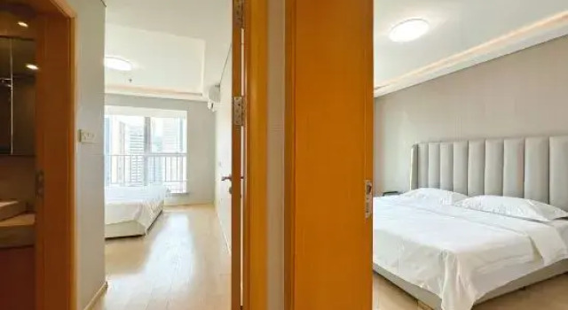 Люкс с 3 комнатами с видом на море Yuepeng Boutique Apartment (Dalian Harbour Plaza)