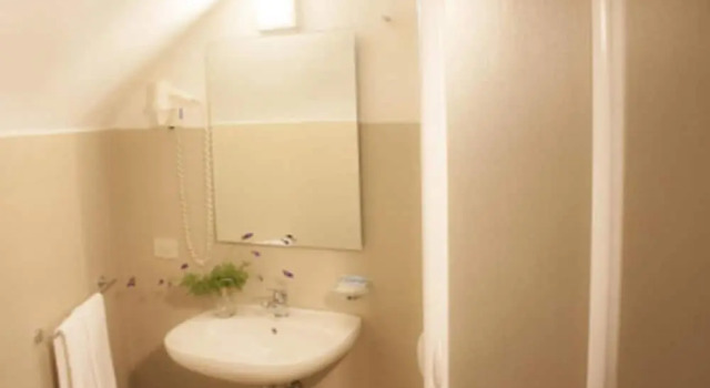 Четырёхместный номер Standard Hotel Villaggio Cala Corvino