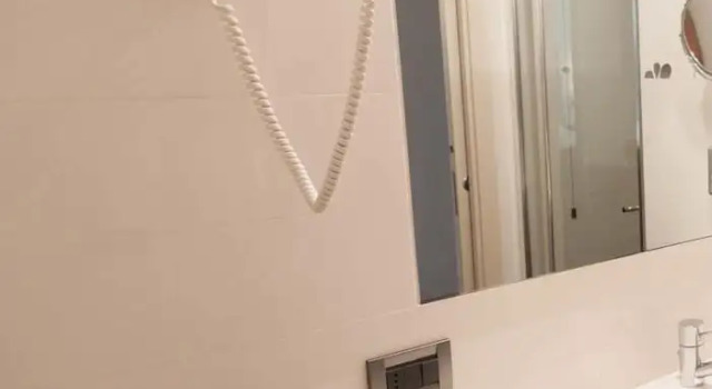 Четырёхместный номер Executive Hotel La Cartiera