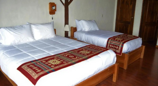 Standaard Driepersoonskamer met balkon Ilatoa Lodge