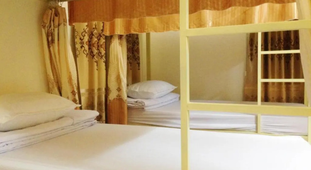 Кровать в общем номере Trang An River View Homestay