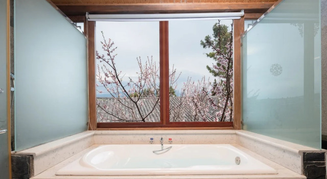 Номер Deluxe Lijiang Merry Inn