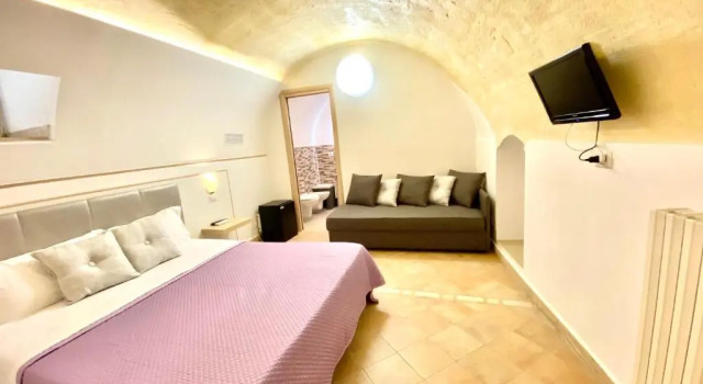 Номер Deluxe Il Sorriso dei Sassi Rooms