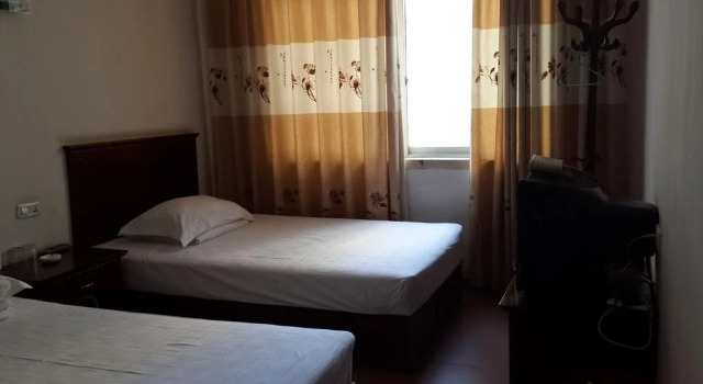 Yuanlai Inn, Prenota Hotel Enshi Prefecture Cina