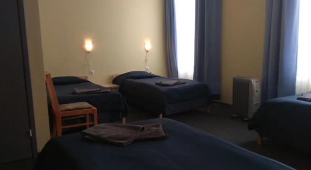 Четырёхместный номер Superior с красивым видом из окна Alex Hotel