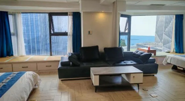 Кровать в общем номере Sea Dream Seaview Hotel (Zhongshan Square Venice Water City)