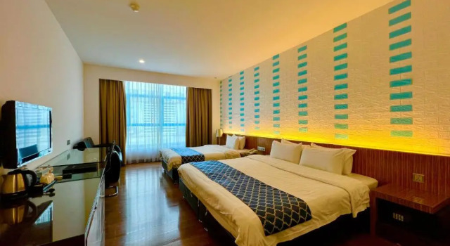 Номер Deluxe New World Express Motel