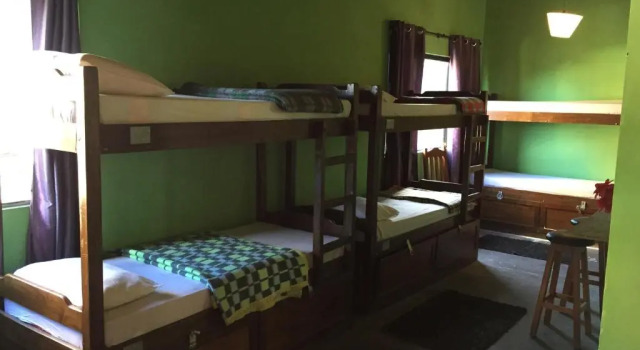 Кровать в общем номере Hotel El Viajero Asuncion