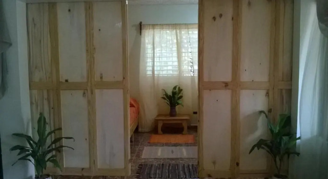 Кровать в общем номере Las Galeras Island Hostel