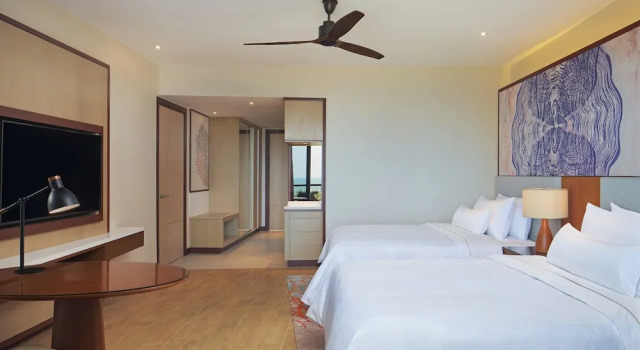 Четырёхместный номер с балконом и с видом на сад The Westin Desaru Coast Resort