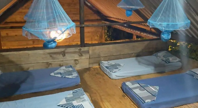 Кровать в общем номере Chalés Recanto da Aldeia